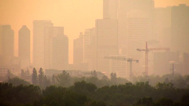 Wildfire smoke invades Calgary, Alberta, Canada. Turning the sky red hours before sunset.