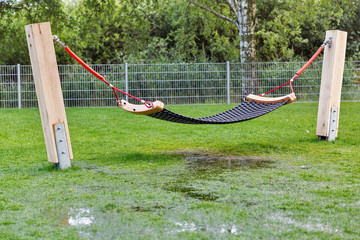 Obraz na płótnie Canvas garden hammock in the rain