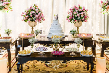 Table decorated with wedding cake