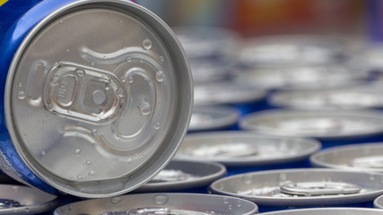 Pattern repeating of beer cans in alcohol and beverage department of superstore