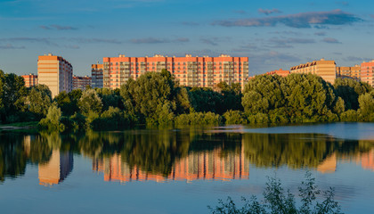 New microdistrict of the Swedish Hill in Gomel. Late evening. Summer sunset. Lake. Belarus