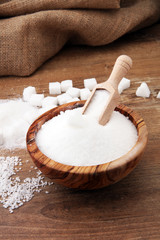 Various types of sugar, white sugar on wooden table.
