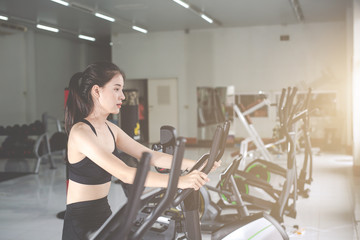 Fototapeta premium Fitness woman health exercise at gym. Healthy workout concepts.