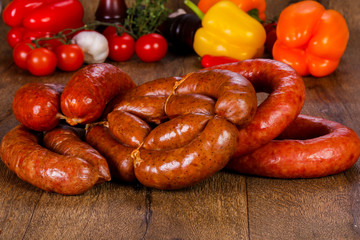 Pork sausages over wooden