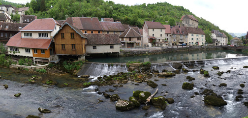 Fototapeta na wymiar Panoramic view of the village of Lods, considered as one of the most beautiful villages of France 