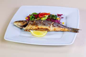 Grilled seabass with lemon