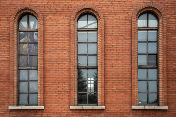 The windows of the old brick train station