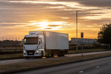 Road transport, Lorry on the road during beautiful sunset