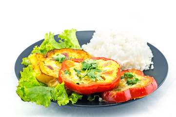 Scrambled eggs fried in the ring of sweet pepper.