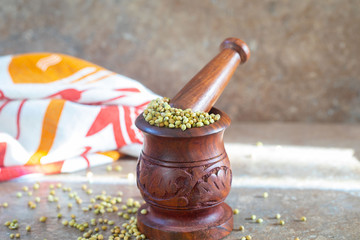 Mortar and Pestle with coriander seeds