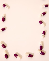 capsules in a U shape on a white background