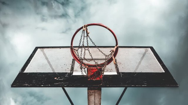 Time lapse Cinemagraph of basketball hoop and net