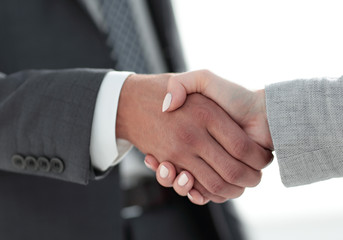 Business people shaking hands isolated on white background