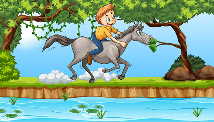 boy riding a horse