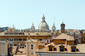 Aerial view of Rome, Italy, near the Pantheon with roof tops and dome of Catholic Church St. Ignatius of Loyola