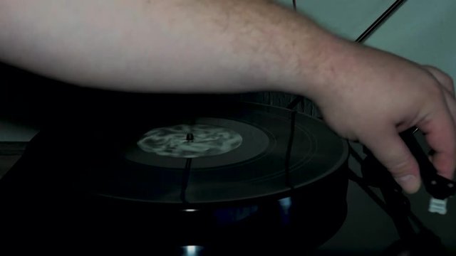 Turning on a vinyl player