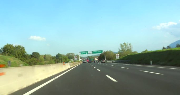 Pov view driving, on Italian highway e45, towards napoli and pompei, on a sunny autumn day, in Italy