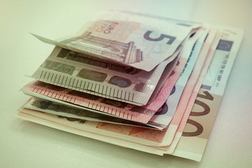 Euro banknotes stacked by value.