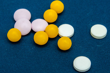 tablets are scattered on the table, dosage for the patient