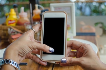 Woman holding a smartphone