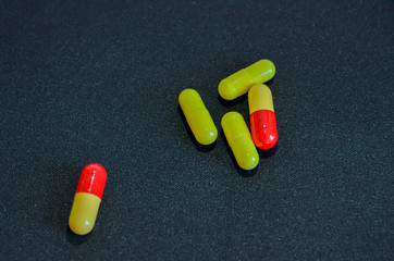 tablets are scattered on the table, dosage for the patient