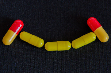 tablets are scattered on the table, dosage for the patient
