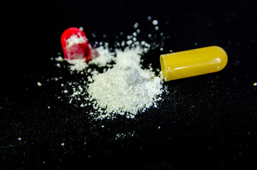 tablets are scattered on the table, dosage for the patient