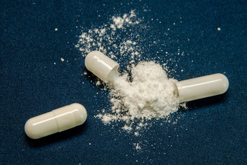 tablets are scattered on the table, dosage for the patient
