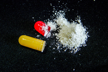 tablets are scattered on the table, dosage for the patient