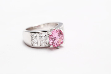 pink gem stone on diamond ring