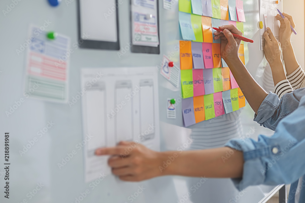 Wall mural creative web designer planning application and developing template layout, framework for mobile phon
