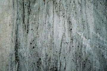 Marble untreated wall with irregularities and cracks