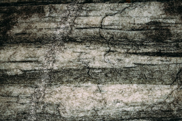 Marble untreated wall with irregularities and cracks
