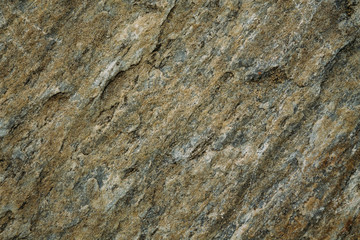 Marble untreated wall with irregularities and cracks