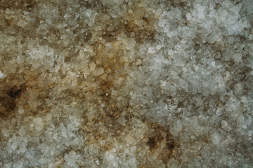 Marble untreated wall with irregularities and cracks