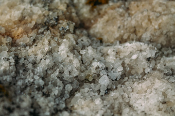 Marble untreated wall with irregularities and cracks