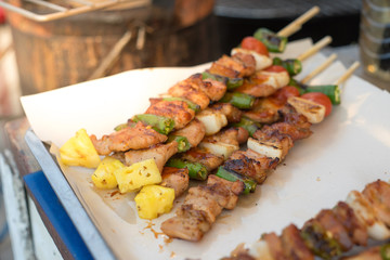  barbecue and roast pork with  vegetable , slice papaya , green pepper, onion, thai street food