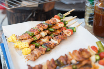  barbecue and roast pork with  vegetable , slice papaya , green pepper, onion, thai street food