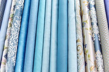 Fototapeta premium Rolls of fabric and textiles in a shop or store