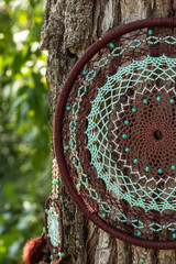 Handmade dream catcher with feathers threads and beads rope hanging