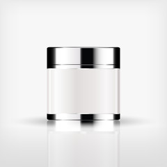 Isolated blank cosmetic bottle with silver cap on white background