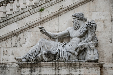 Obraz premium Statue of Neptune at Piazza del Campidoglio, Rome, Italy