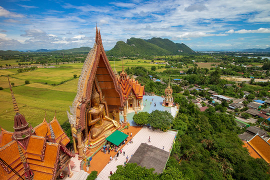 Big golden Buddha statue in Tiger cave temple (Wat thum suea), a buddhist temple of Kanchanaburi Province, Thailand