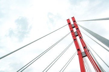 Red metal bridge tower