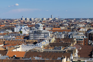 Obraz premium Top view of city landscape with blue sky