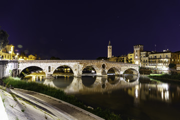 Fototapeta na wymiar Roman arch bridge crossing the Adige River in Verona, Italy