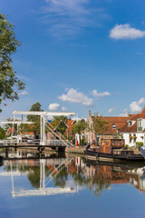 Fototapeta premium White bridge with reflection in he canal in Edam, Netherlands