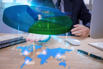 Businessman show visual circle graph on screen show Business success and destination of business profit.
