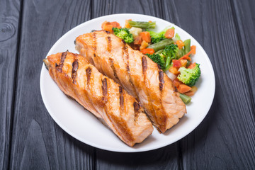 Grilled salmon fish with vegetables