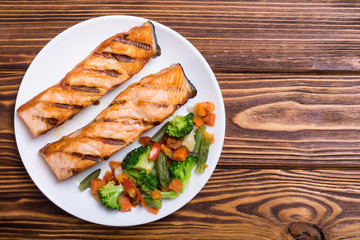 Grilled salmon fish with vegetables